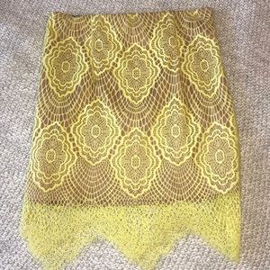 Yellow lace mini skirt